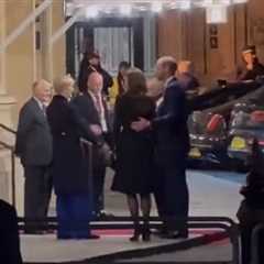 Prince William puts arm around wife Kate Middleton as they attend Festival of Remembrance